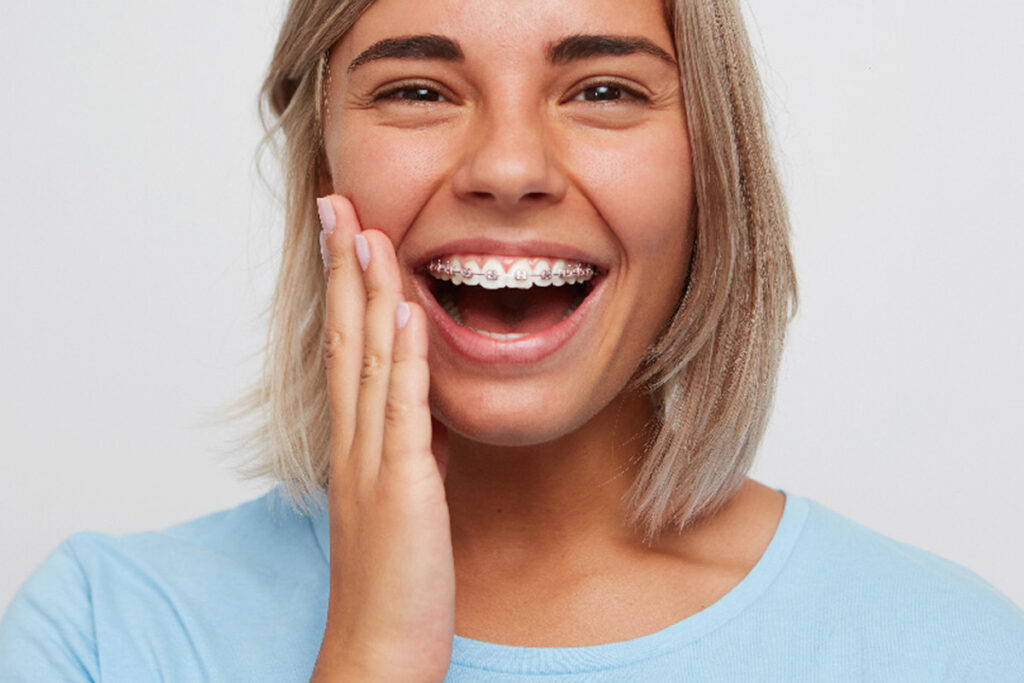 smiling woman with braces